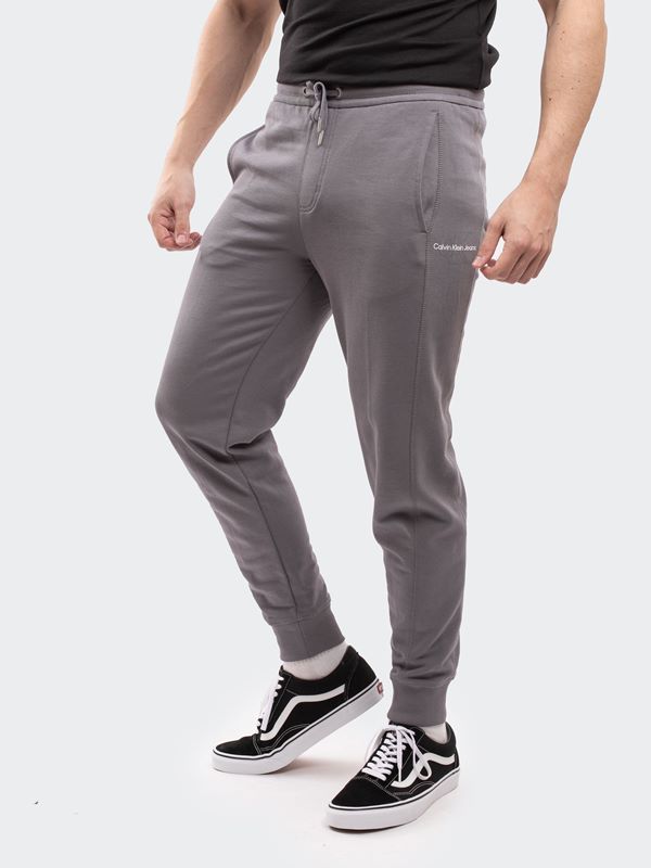 Calvin Klein Jeans Men's Monogram Logo Hwk Sweatpants in Fossil Grey |  Dapper Street